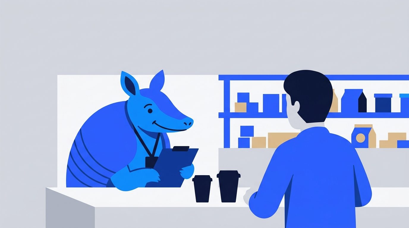 Arlo the armadillo sits across a shop counter from a business owner, clipboard in hand, during a business visit